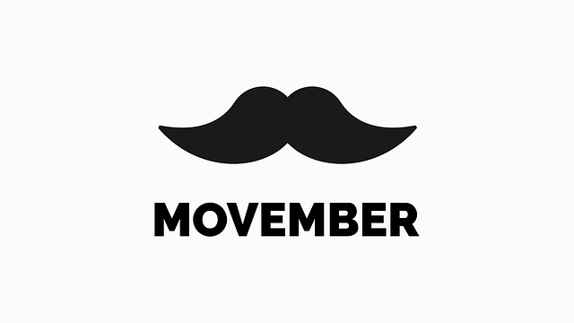 črni zavihani brki in napis movember